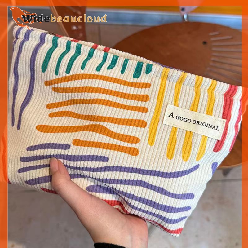 Widebeaucloud กระเป๋าเครื่องสําอาง ผ้าลูกฟูก ลายทาง หลากสี แบบพกพา สําหรับเดินทาง