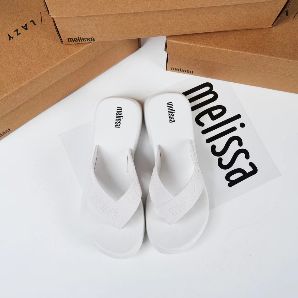 [สต๊อกพร้อม]รองเท้าเจลลี่สไตล์ใหม่หนาSoled Flip-flopsรองเท้าชายหาดลิ่มผู้หญิง