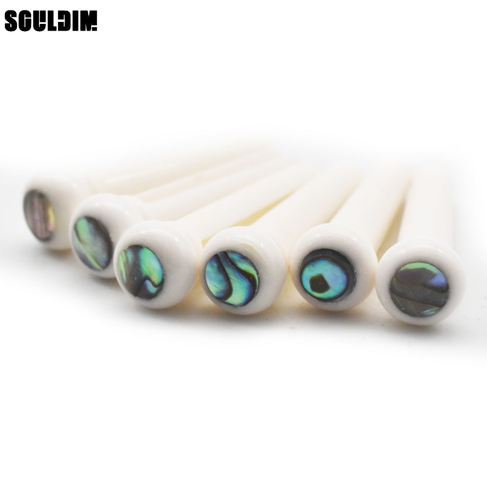 6ชิ้นกระดูกจริงอะคูสติกกีตาร์สะพาน หมุด กระดูกบริสุทธิ์ไม้มะเกลือสะพานขาที่มีวงกลมทองเหลืองสําหรับกีตาร์พื้นบ้านอุปกรณ์ทดแทน