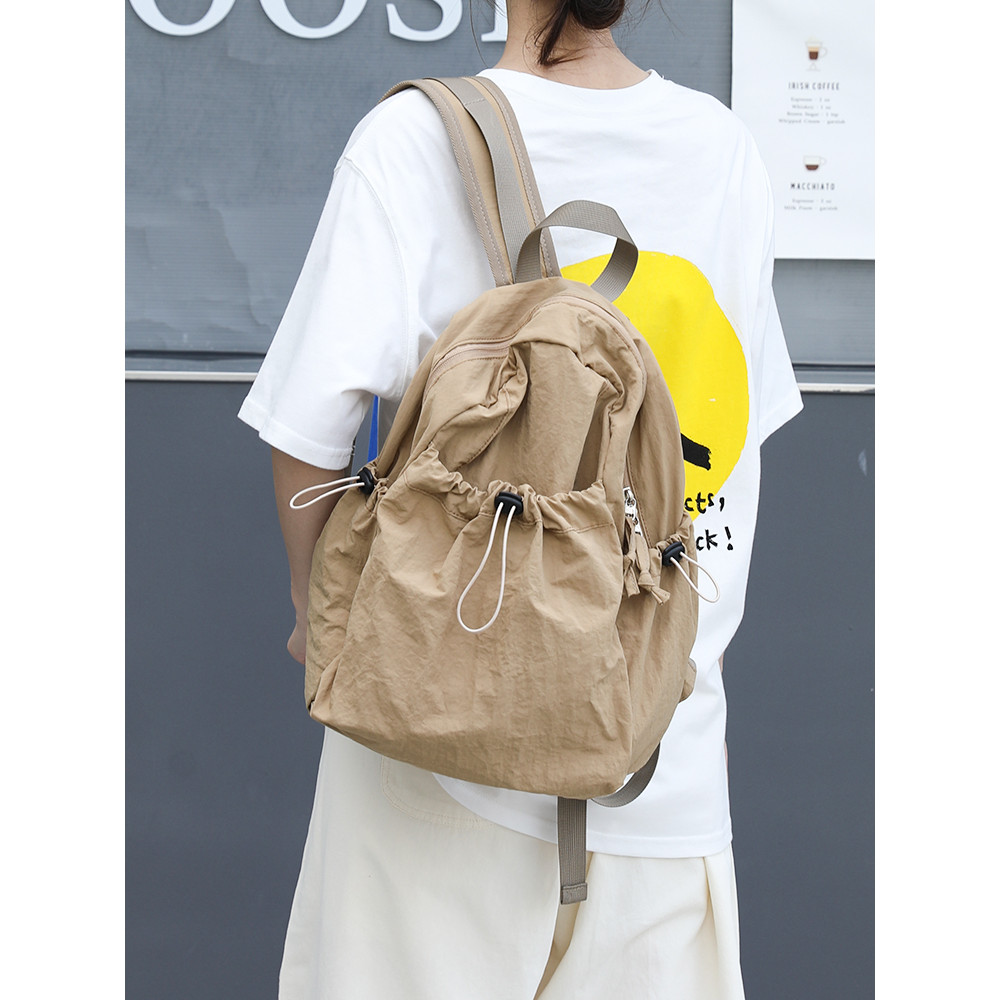 เวอร์ชั่นเกาหลีของ อิน ซอก กระเป๋าเป้สะพายหลังไนลอนน้ําหนักเบาสําหรับนักศึกษาวิทยาลัยหญิงความจุขนาดใหญ่ลําลองผ้าใบอเนกปร