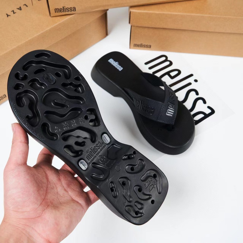 [สต๊อกพร้อม]รองเท้าเจลลี่สไตล์ใหม่หนาSoled Flip-flopsรองเท้าชายหาดลิ่มผู้หญิง