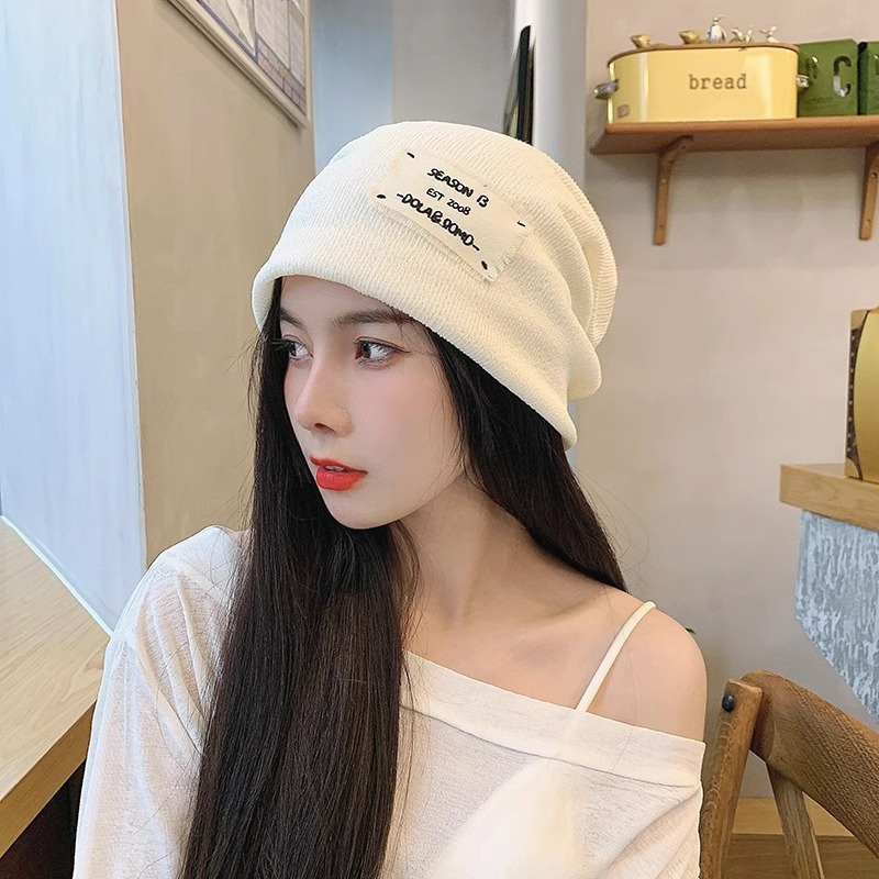 หมวกบีนนี่ถัก ผ้าฝ้ายนิ่ม พิมพ์ลายตัวอักษร ทรงหลวม สีพื้น แฟชั่นฤดูใบไม้ร่วง และฤดูหนาว สําหรับผู้ชาย และผู้หญิง