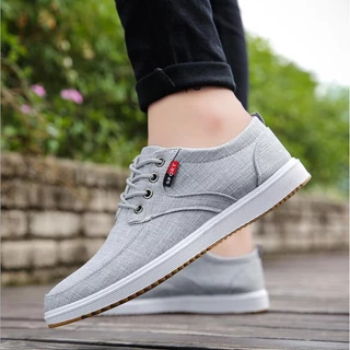รองเท้าผ้าใบผู้ชาย รองเท้าลำลองแบบผูกเชือก ใส่สบาย กันลื่น Sneakers Men Shoes ไซส์ 39-45