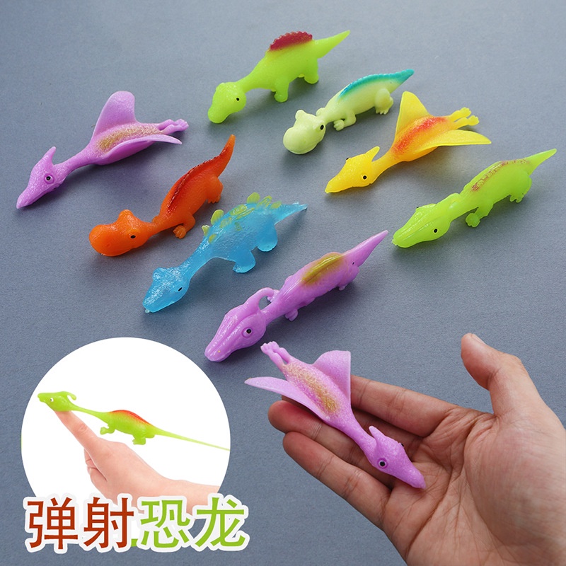 Creative ไดโนเสาร์นิ้วมือ Catapult Decompression ของเล่น TPR ยางนุ่ม Finger Slingshot เด็กใหม่ Exotic ของเล่น