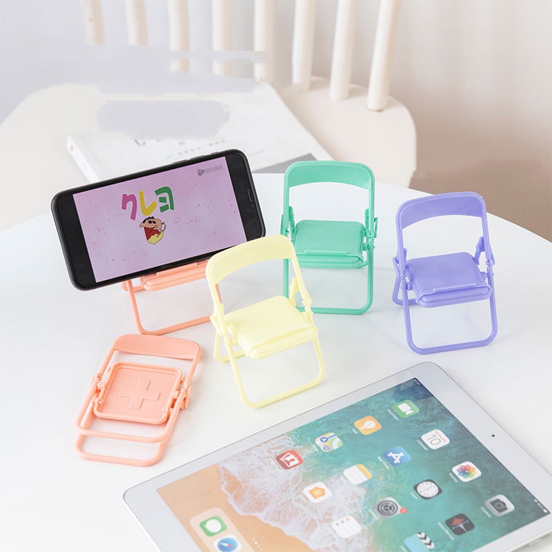 ขาตั้งโทรศัพท์มือถือ แบบพับได้ สีมาการองน่ารัก แบบพกพา สร้างสรรค์ สําหรับตกแต่งโต๊ะ