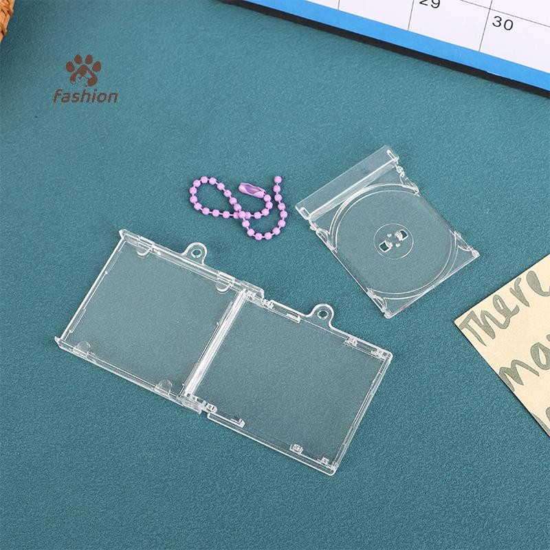 [แฟชั่น] อัลบั้มเปล่าซีดีกรณีพวงกุญแจเครื่องเล่นซีดีพวงกุญแจอุปกรณ์ต่อพ่วงอัลบั้มที่ระลึกที่เก็บกุญแจสําหรับ ทําเอง กระเป๋าเป้สะพายหลังจี้ {ไทย}