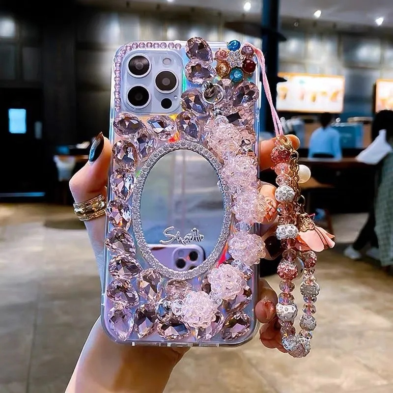 Glitter Rhinestoneสร้อยข้อมือหินเงาสายรัดข้อมือกระจกเคสโทรศัพท์สําหรับIPhone 16 15 14 Pro Max IP 11 12 13 Pro Max Plus Blingเพชรพร้อมโซ่มือ