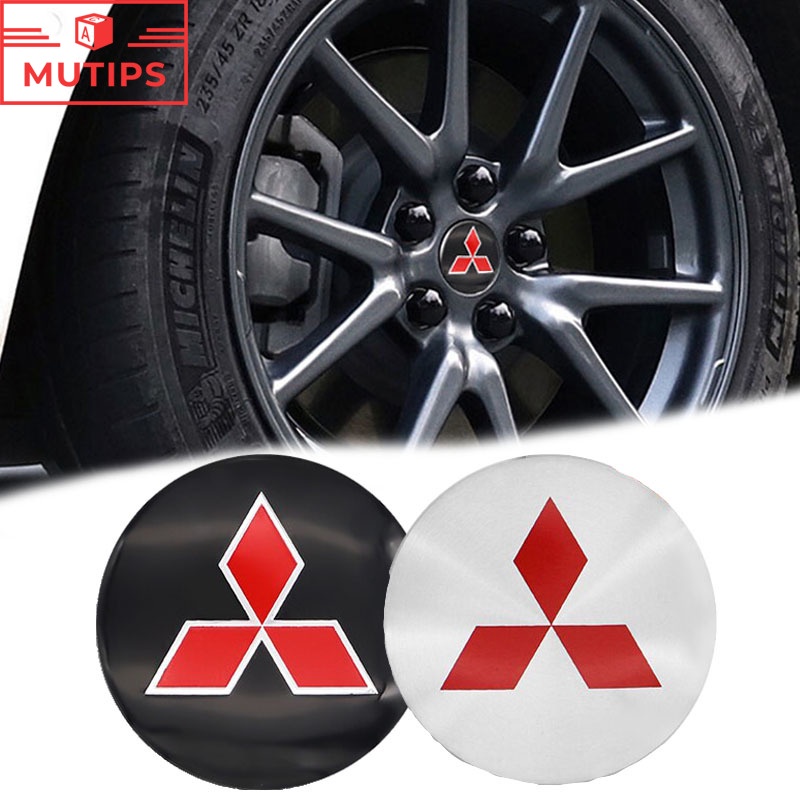 Mitsubishi 4 ชิ้น 56 มม สติ๊กเกอร์อลูมิเนียมติดตกแต่งล้อรถยนต์ สําหรับตกแต่งขอบล้อรถยนต์ สติกเกอร์โลโก้ Xpander Cross Triton Grandis Attrage Mirage Outlander Pajero Sport ASX