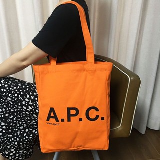 A.p.c กระเป๋าสะพายไหล่ กระเป๋าช้อปปิ้ง ผ้าแคนวาส สีสดใส แฟชั่นสําหรับสตรี