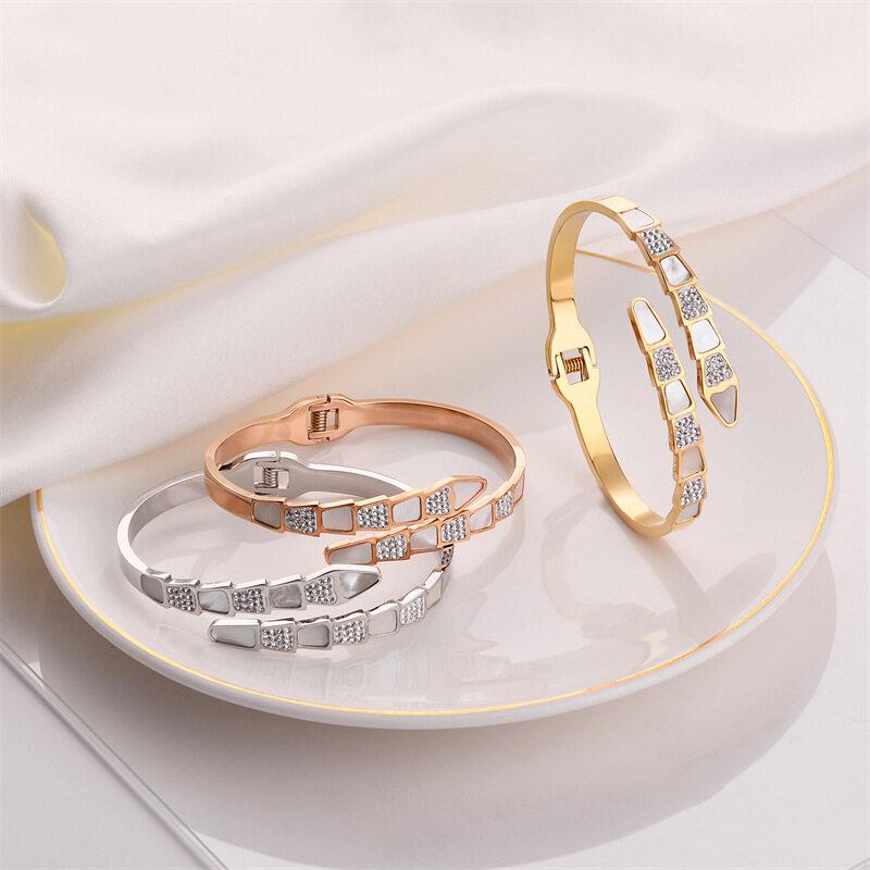 nueng 18k สร้อยข้อมือแฟชั่นกระดูกงูที่นิยมในโลกออนไลน์สร้อยข้อมือเหล็กไทเทเนียมแบบเปิดได้สำหรับผู้หญิง #9903