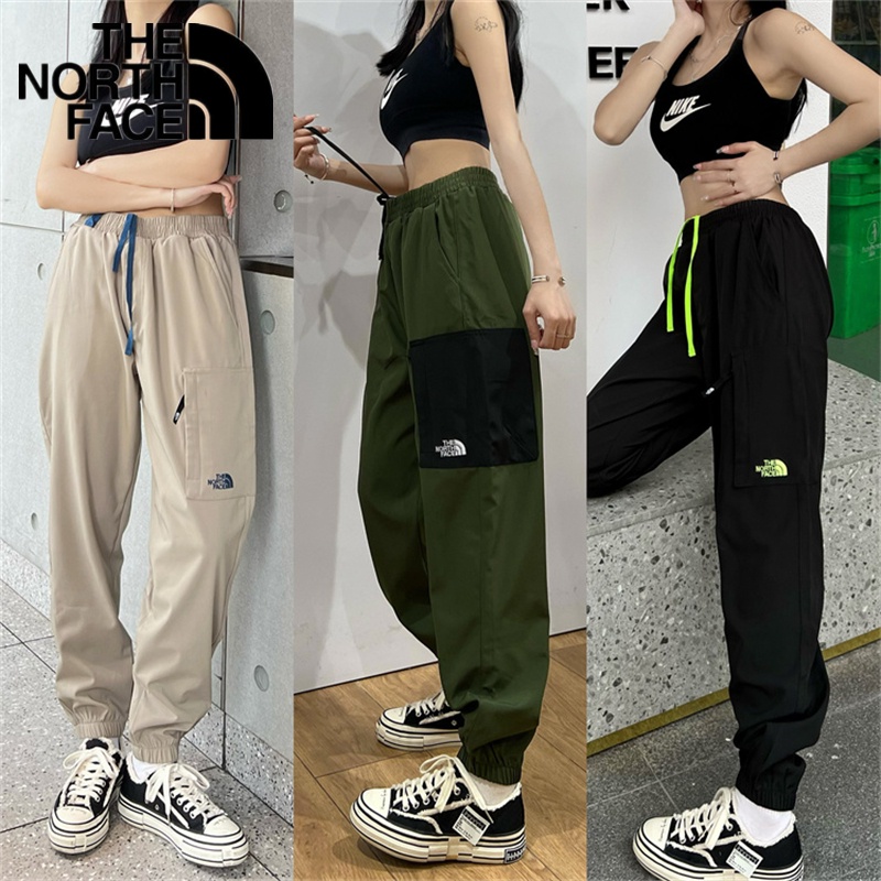 กางเกงฮาเร็ม ขากว้าง ปักลายโลโก้ The North Face 100% ยืดหยุ่น เหมาะกับการเล่นกีฬา สําหรับผู้ชาย และผู้หญิง