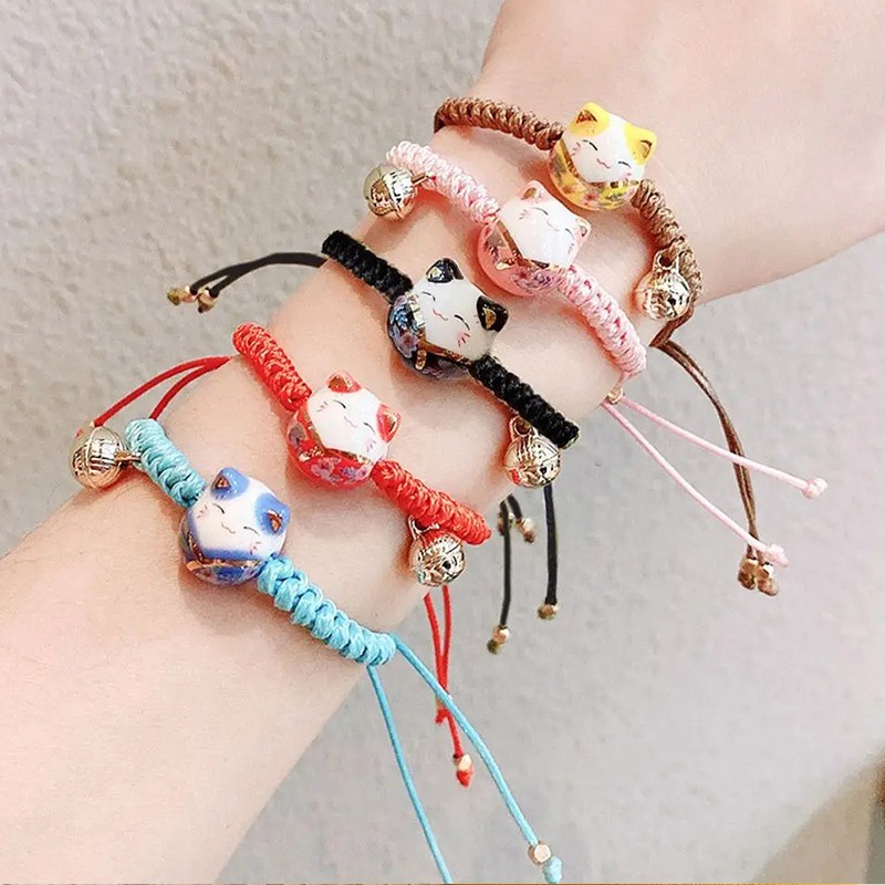 สร้อยข้อมือลูกปัดเซรามิค รูปแมวนําโชค สามารถปรับได้ เหมาะกับของขวัญคู่รัก สําหรับนักเรียนหญิง