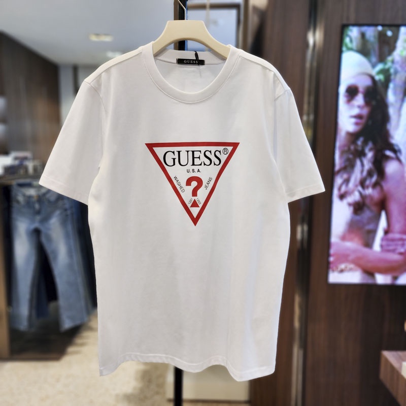 Guess ใหม่ เสื้อยืดลําลอง แขนสั้น คอกลม พิมพ์ลายโลโก้ ขนาดใหญ่ สีขาว เหมาะกับการเล่นกีฬา หน้าร้อน สําหรับผู้ชาย ผู้หญิง