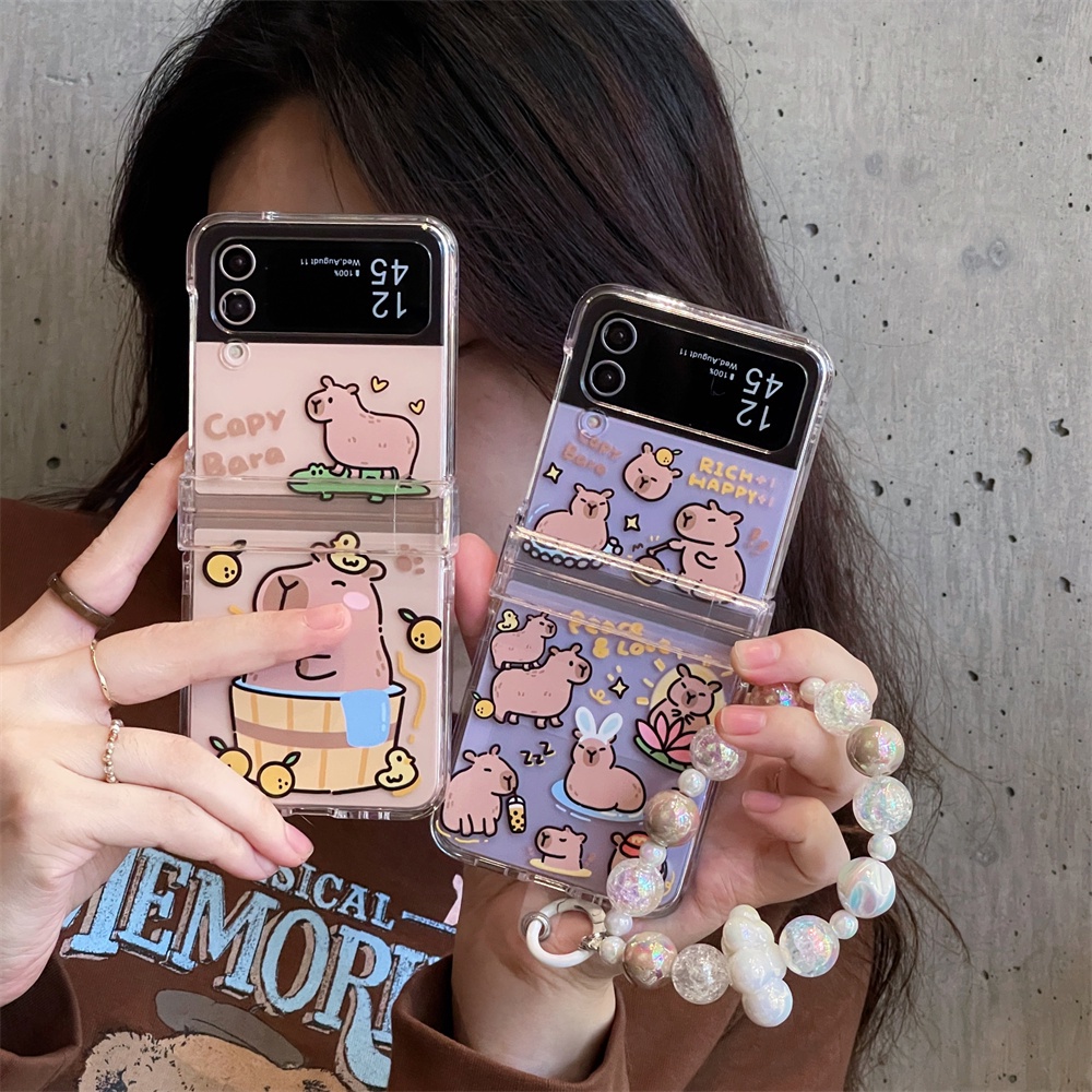 เคสโทรศัพท์มือถือ ลายการ์ตูนคาปิบาราน่ารัก พร้อมสายโซ่คล้องมือ สําหรับ Samsung Galaxy Z Flip 4 3 5 Z Flip4 Flip3 Zflip 5