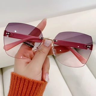 ผู้หญิงแว่นตากันแดดไม่มีขอบ UV400 เลนส์ไล่ระดับสี Retro แฟชั่น Beach Shades