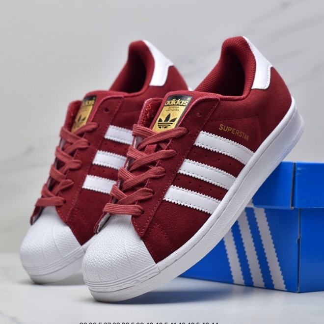 Adidas Superstar รองเท้าหนังหุ้มข้อ พื้นกลาง ยืดหยุ่นสูง สีแดง ด้านหน้า และด้านหลัง