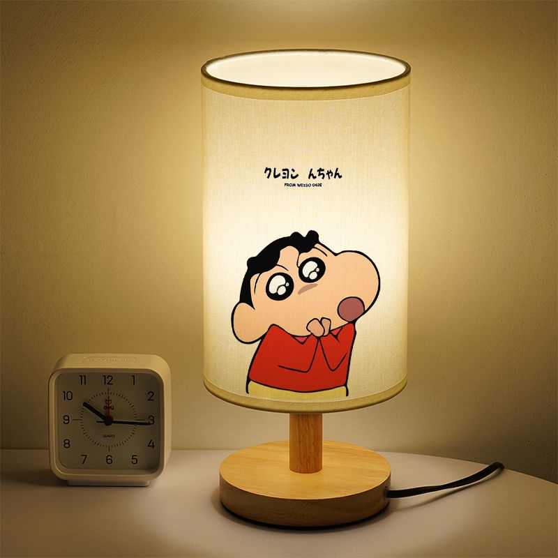 โดยใช้รูปแบบการ์ตูนชินจังเป็นโคมไฟตั้งโต๊ะ นํา ลักษณะเฉพาะเพื่อปกป้องวิสัยทัศน์ให้ความอบอุ่นเหมาะสําหรับหอพักนักศึกษาสร้างสรรค์