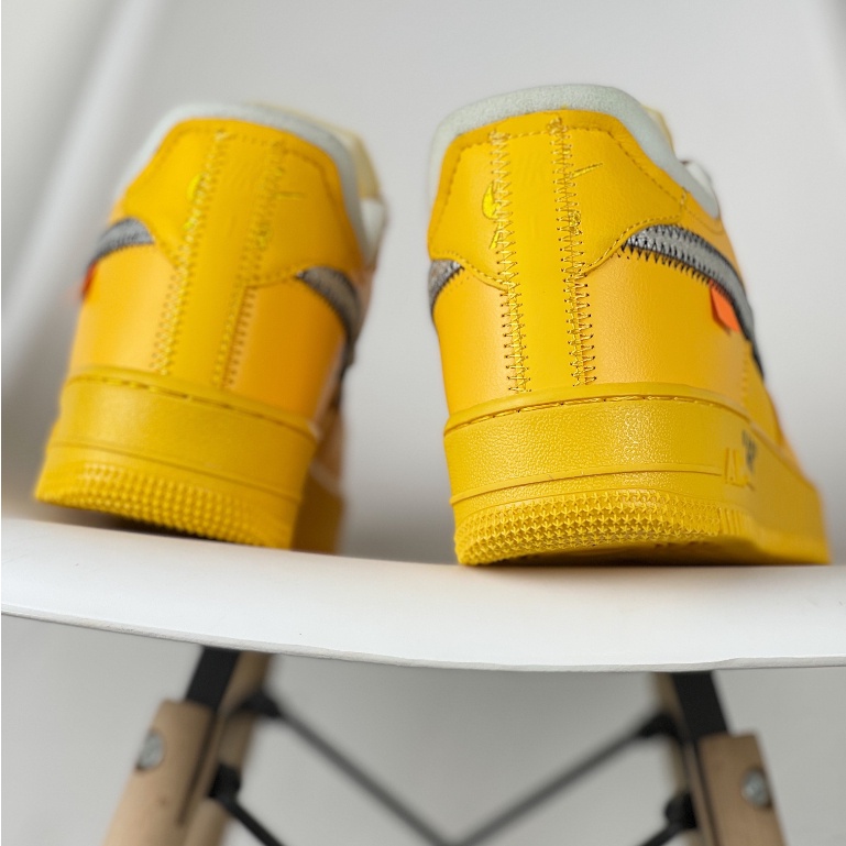 Off-White x Nike Air Force 1 Low cut Sports Basketball Shoes ผ้าใบลำลองสำหรับผู้ชายผู้หญิงสีเหลือง