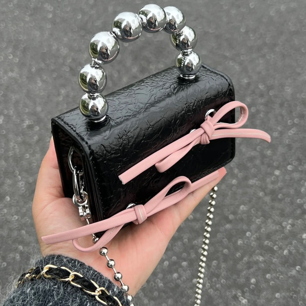 Tonfashion กระเป๋าสะพายไหล่ กระเป๋าถือ หนัง PU ประดับโบว์ ขนาดเล็ก ใส่หูฟังได้ แฟชั่นสําหรับสตรี