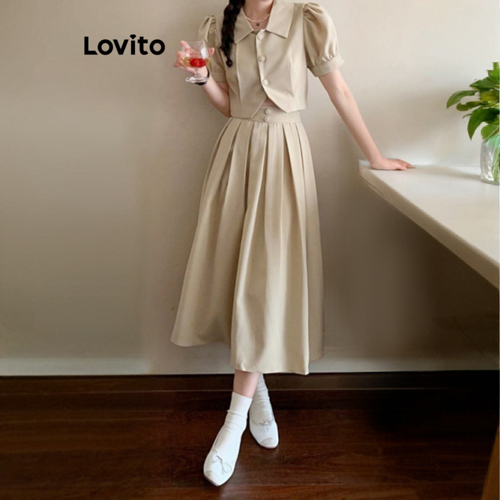 Lovito เสื้อเบลาส์ผู้หญิง แขนพัฟ กระดุมด้านหน้า สีพื้น สไตล์ลำลอง L64AD015 (สีกากีอ่อน)