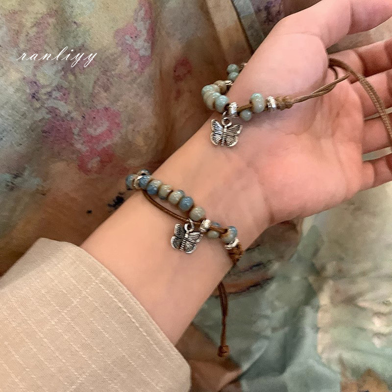 ส่งเร็ว🌼สร้อยข้อมือลูกปัดจี้ผีเสื้อวินเทจสไตล์จีนเชือกถักปรับได้หรูหราเครื่องประดับผู้หญิงเข้ากับทุกการแต่งกาย-Ranliyy