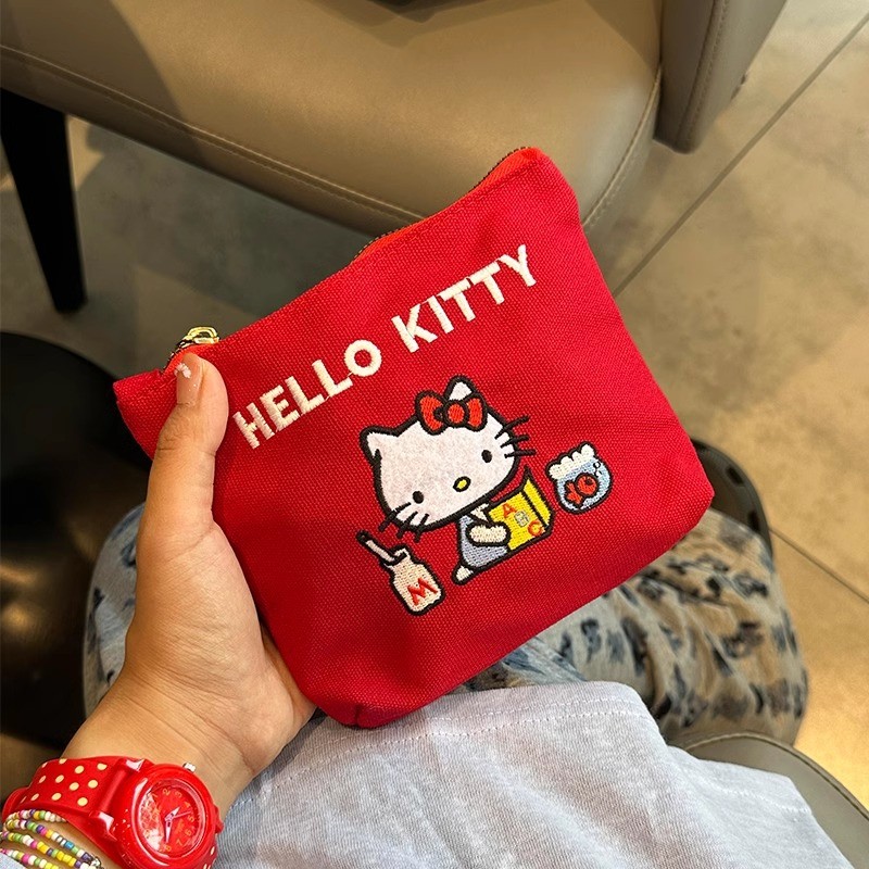 Hello Kitty กระเป๋าใส่เหรียญผ้าใบน่ารักแบบพกพาเย็บปักถักร้อยความจุขนาดใหญ่กระเป๋าแต่งหน้าการจัดเก็บความงามสูงถุงแป้ง