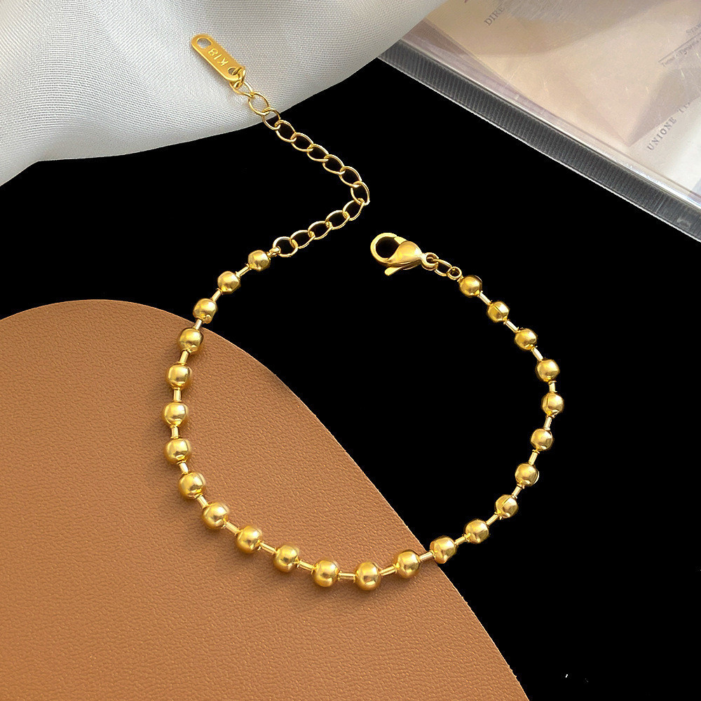 สร้อยข้อมือ ลูกปัดเหล็กไทเทเนียม 18K ทรงกลม ไม่จางหาย คุณภาพสูง เข้ากับทุกการแต่งกาย แฟชั่น