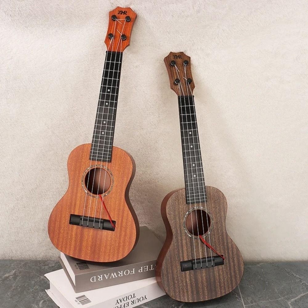 SWIFTSAVER จําลอง Ukulele ของเล่น,ปรับ String Knob คลาสสิก Ukulele เครื่องดนตรีของเล่น,โรงเรียนเล่นเกม Yukrili ของเล่น Playable ทนทานกีตาร์ขนาดเล็กของเล่นเกมกลางแจ้ง - รูปที่ 4