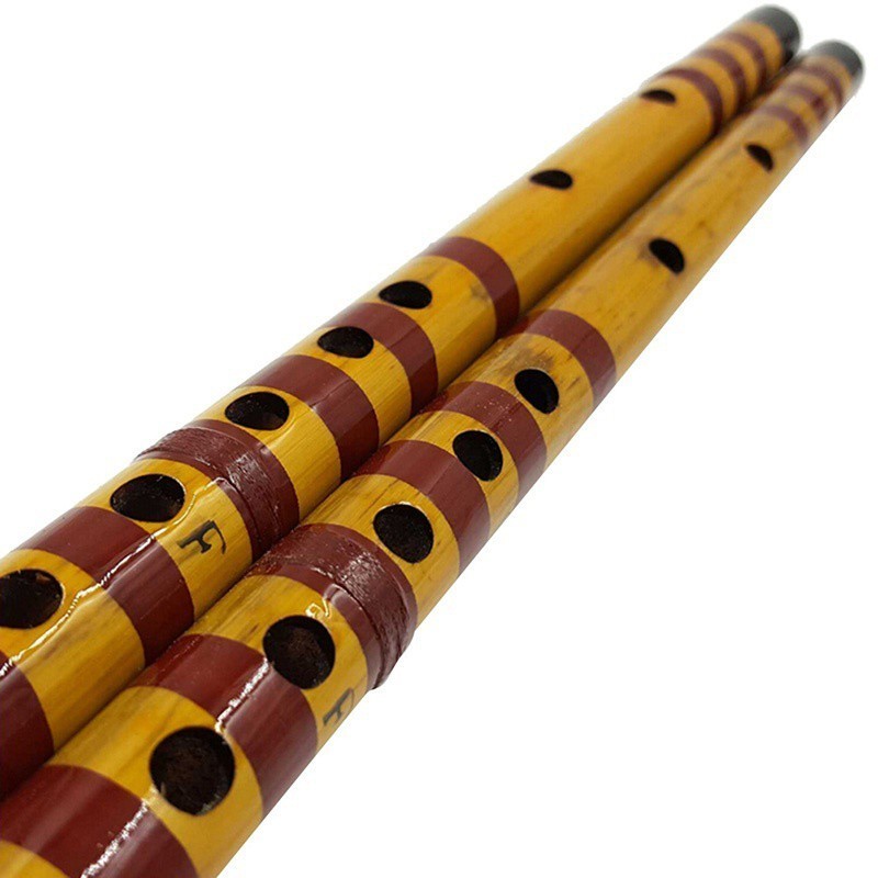 เครื่องดนตรี Bansuri ขลุ่ยไม้ไผ่ทำด้วยมือสีน้ำตาลอินเดียแบบดั้งเดิม