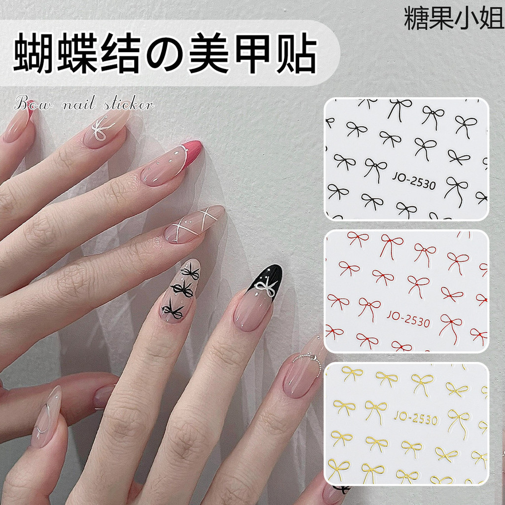 สติ๊กเกอร์แต่งเล็บโบว์สีดําสีขาวทองเงินริบบิ้นสีแดงโบว์สวมใส่สติ๊กเกอร์ติดเล็บ