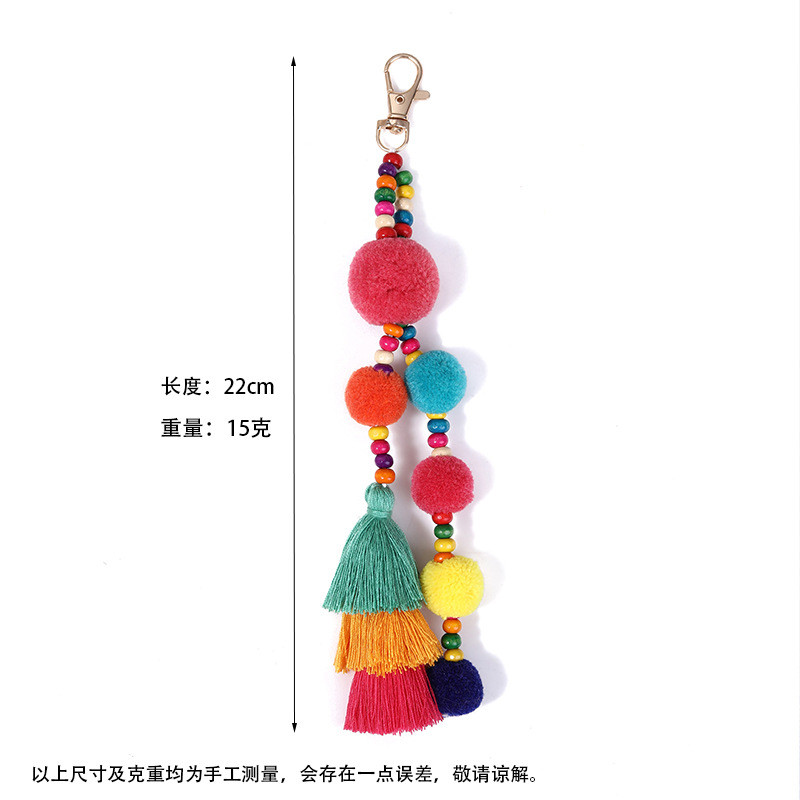 Boho สไตล์ลูกผมพู่พวงกุญแจฤดูร้อน Beach Shell พวงกุญแจสีสันสดใส Pompom พวงกุญแจสําหรับผู้หญิงกระเป๋าจี้แขวน ราคา ถูกที่สุด ดีลบีเคเค แกลเลอรีภาพที่ 2