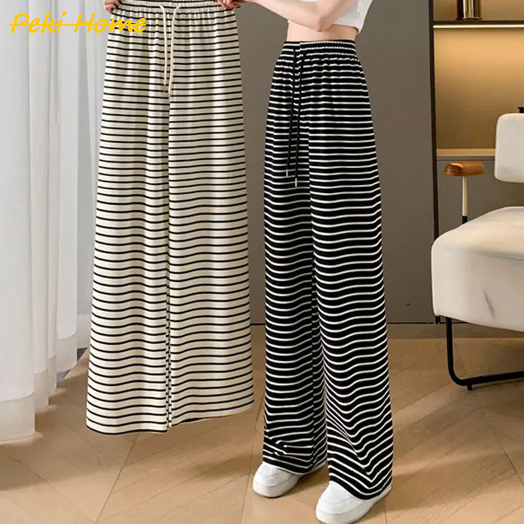 กางเกงเป็นแบบเกาหลีสไตล์สไตล์ ลายลายดำขาว ผ้าอ่อนนุ่ม สวมใส่สบาย สไตล์เท่สบาย