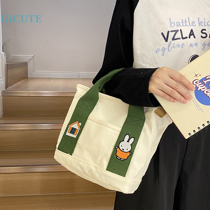 Gjcute กระเป๋าถือ กระเป๋าเดินทาง ผ้าแคนวาส ลําลอง ความจุขนาดใหญ่ สีพื้น สําหรับสตรี WTD - รูปที่ 6