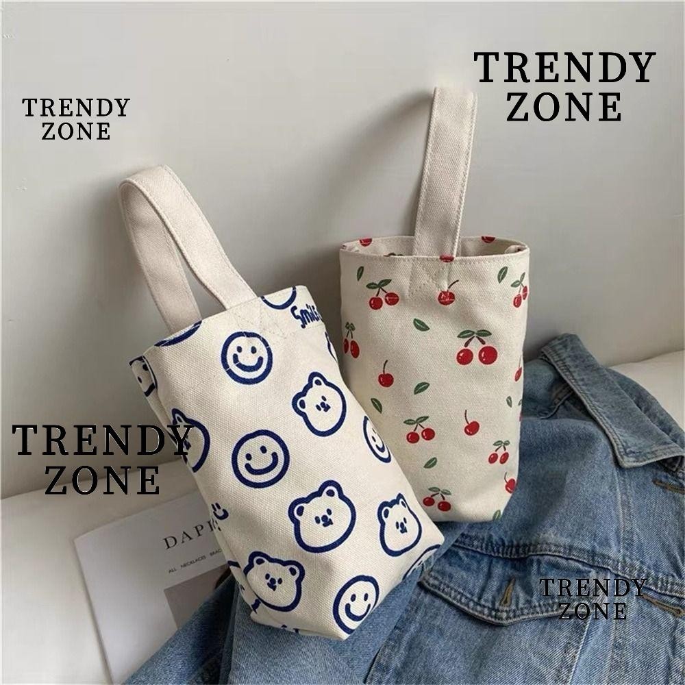 Trendyzone กระเป๋าถือ ผ้าแคนวาส พิมพ์ลายการ์ตูนกราฟฟิติน่ารัก ขนาดเล็ก สําหรับผู้หญิง