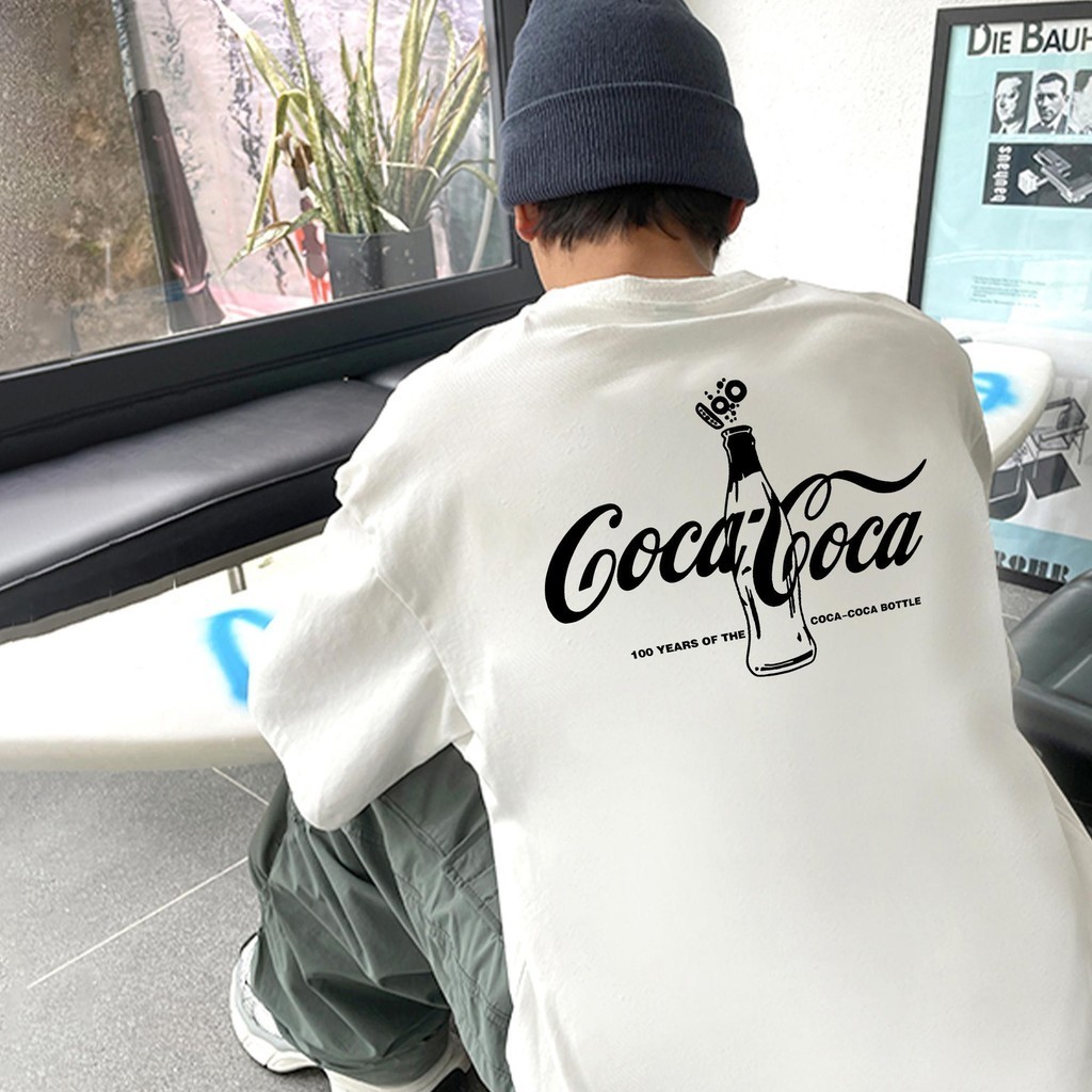 Basi เสื้อยืด ผ้าฝ้าย ไม่ยืดไม่ย้วย โอเวอร์ไซส์ ลาย "COCACOCA"เสื้อยืดคอกลอมชายหญิงแบบนิ่มใส่สบาย สไตล์เกาหลี มินิมอล