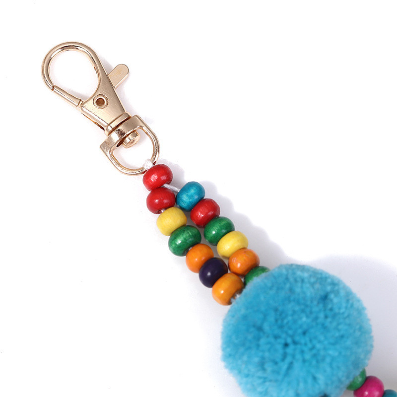 Boho สไตล์ลูกผมพู่พวงกุญแจฤดูร้อน Beach Shell พวงกุญแจสีสันสดใส Pompom พวงกุญแจสําหรับผู้หญิงกระเป๋าจี้แขวน ราคา ถูกที่สุด ดีลบีเคเค แกลเลอรีภาพที่ 5
