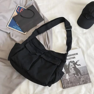 2025 ใหม่ Commuter Messenger กระเป๋าผ้าใบกระเป๋าถือลําลองขนาดใหญ่ความจุบุคลิกภาพ Simple Elegant อเนกประสงค์นักเรียน Retro กระเป๋านักเรียน