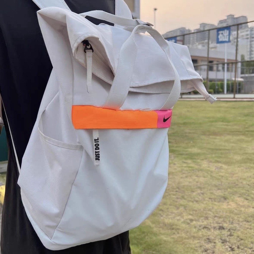 NIKE Nike Rainbow นักเรียนชายและหญิงเดินทางกลางแจ้งกระเป๋าเป้สะพายหลังความจุขนาดใหญ่กระเป๋าเป้สะพาย