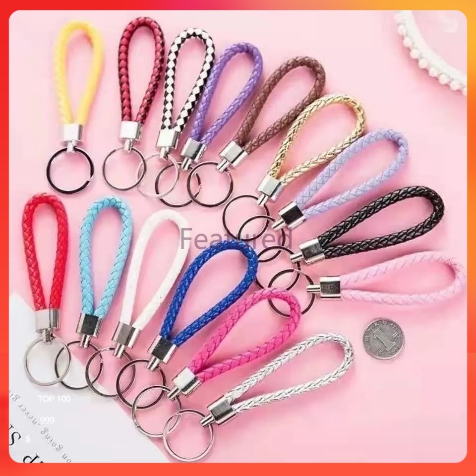 Featured พวงกุญแจแฟชั่นหนังPU แฮนด์เมดถักเชือกใช้สำหรับเป็นพวงกุญแจรถพวงกุญแจ