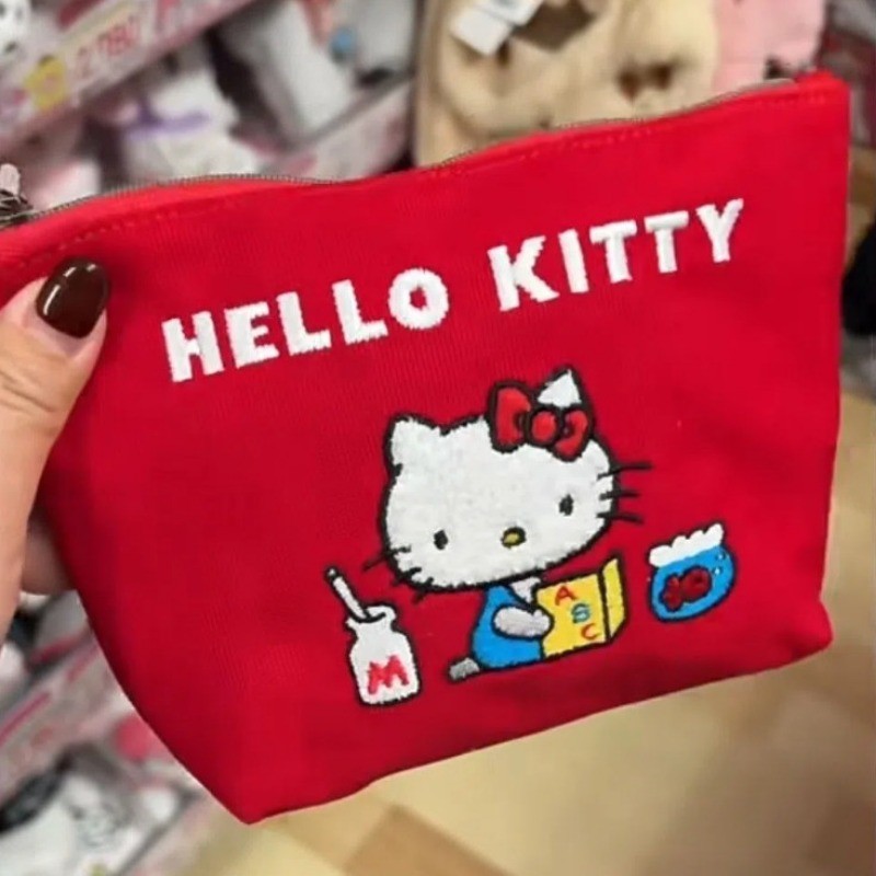 Hello Kitty กระเป๋าใส่เหรียญผ้าใบน่ารักแบบพกพาเย็บปักถักร้อยความจุขนาดใหญ่กระเป๋าแต่งหน้าการจัดเก็บความงามสูงถุงแป้ง