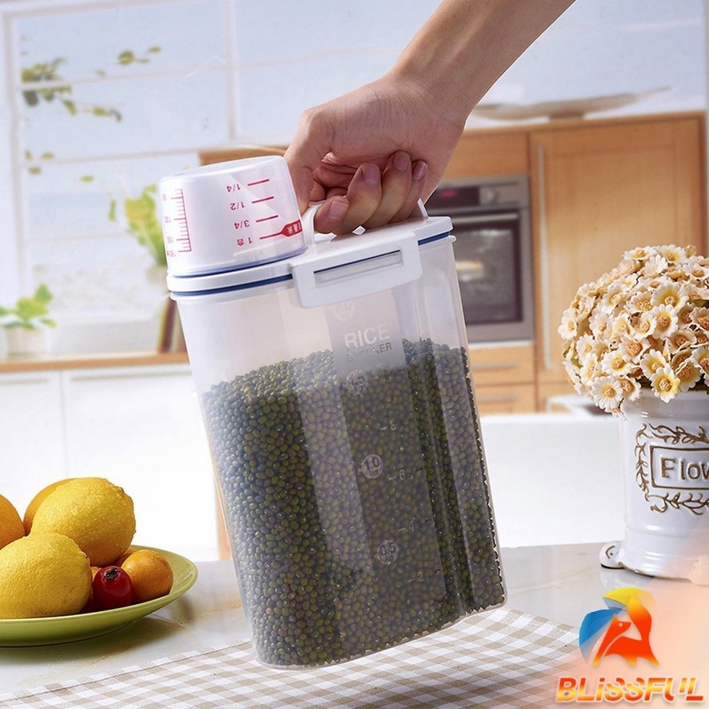 กล่องพาสติกเก็บเมล็ดข้าวสาร ทรงกระบอกน้ำ กันแมลง ความจุ 2 Kg. พร้อมถ้วยตวง Rice Container