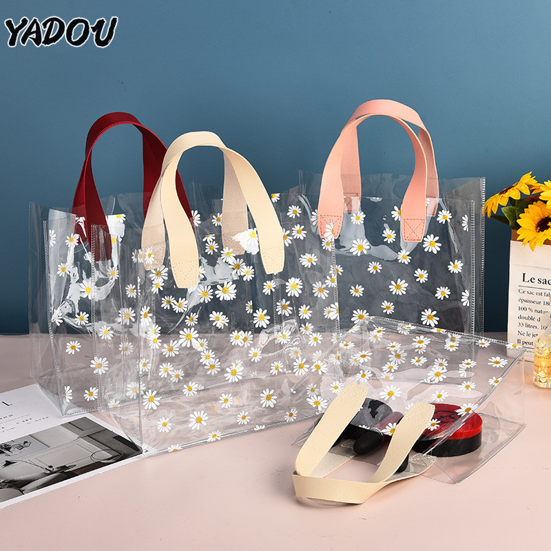 Yadou กระเป๋าช้อปปิ้ง PVC แบบใส ขนาดเล็ก กันน้ํา ลายดอกเดซี่ พร้อมหูหิ้ว คุณภาพสูง