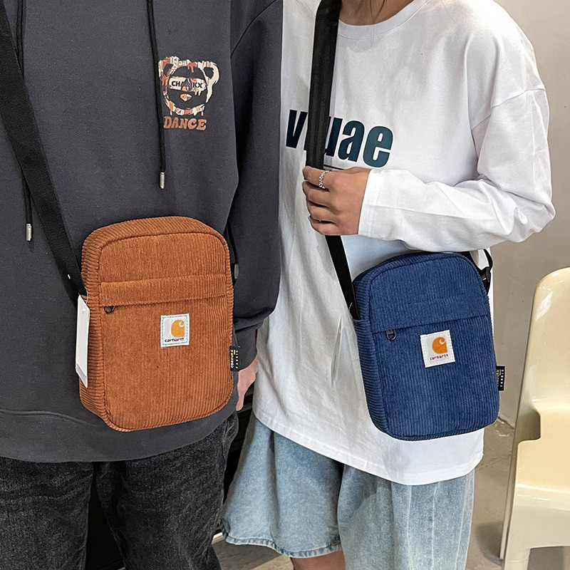 Carhartt กระเป๋าสะพายไหล่ กระเป๋าใส่โทรศัพท์มือถือ มีซิป เหมาะกับของขวัญวันเกิด วันวาเลนไทน์ สําหรับผู้ชาย และนักเรียน