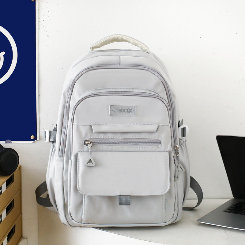 IELGY ไนลอนกระเป๋าเป้สะพายหลังกันน้ําผู้หญิงความจุขนาดใหญ่กระเป๋านักเรียน หลาย ออกแบบ ผู้ชายการจัดเก็บเป้สบายๆ - รูปที่ 4