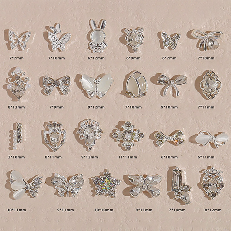 โลหะเงินเพิร์ลผีเสื้อ Bowknot Rhinestones ตกแต่งเล็บ DIY Nail Art Charms อุปกรณ์เสริม
