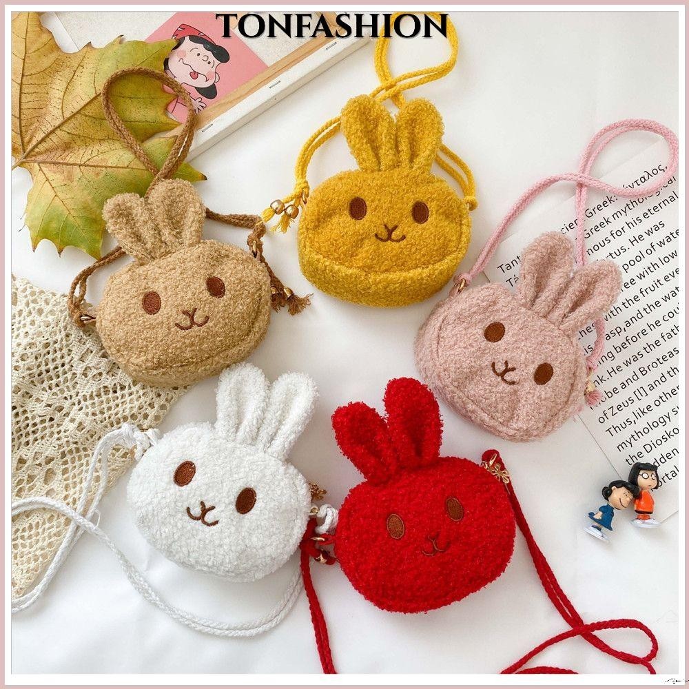 Tonfashion กระเป๋าสะพายข้าง หูรูด ลายกระต่ายน้อยน่ารัก