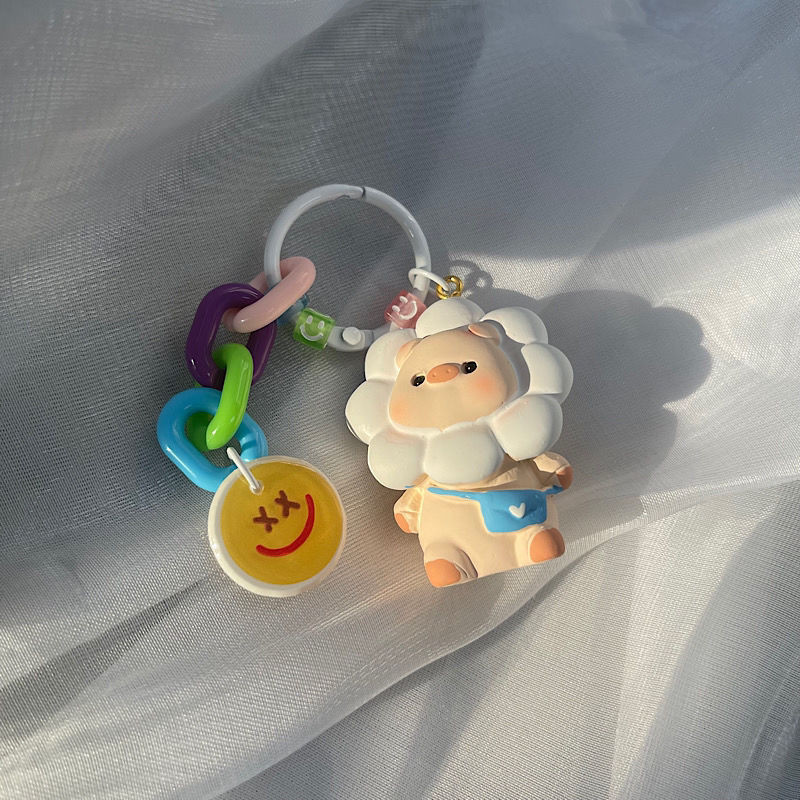 การ์ตูนหมูดอกทานตะวันเรซิ่นพวงกุญแจน่ารักรถพวงกุญแจสร้างสรรค์นักเรียนกระเป๋าเป้สะพายหลังจี้ตกแต่ง - รูปที่ 6