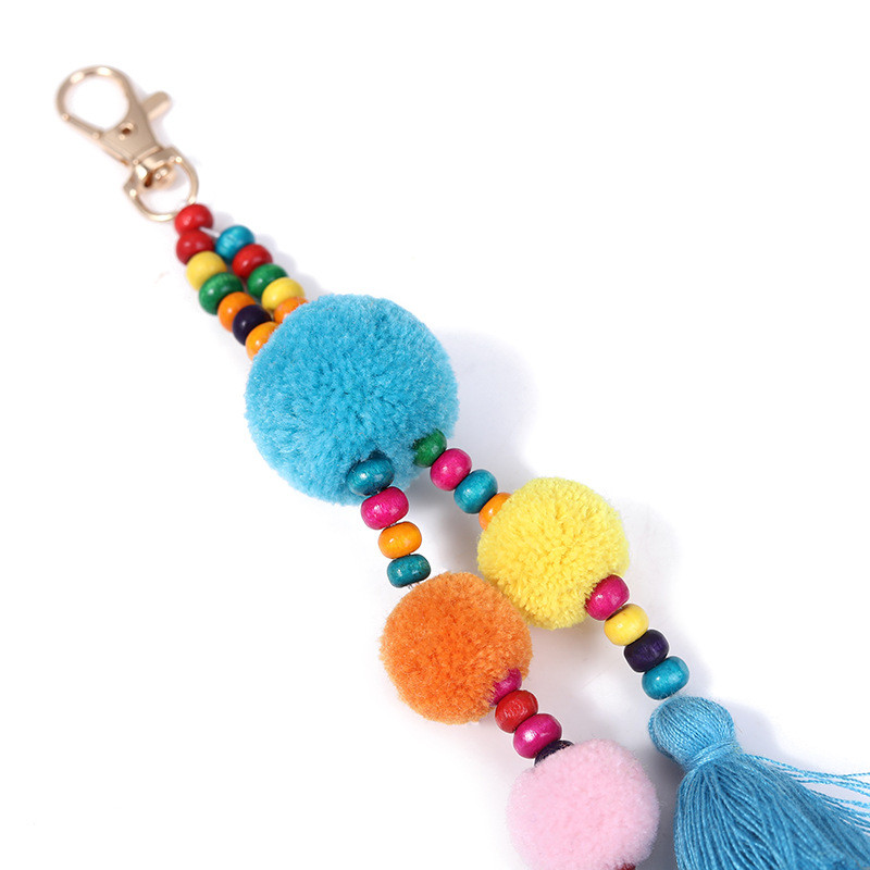 Boho สไตล์ลูกผมพู่พวงกุญแจฤดูร้อน Beach Shell พวงกุญแจสีสันสดใส Pompom พวงกุญแจสําหรับผู้หญิงกระเป๋าจี้แขวน ราคา ถูกที่สุด ดีลบีเคเค แกลเลอรีภาพที่ 4