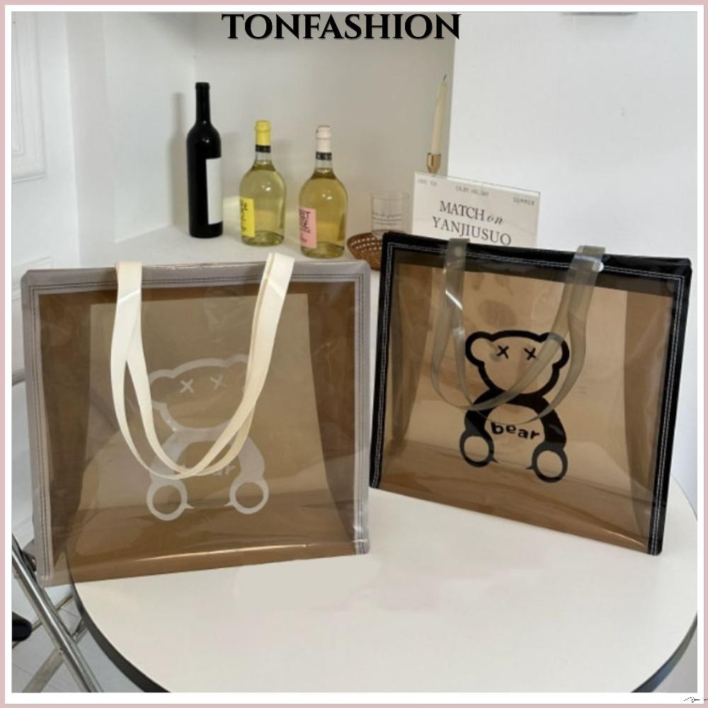 Tonfashion กระเป๋าสะพายไหล่ กระเป๋าถือ PVC ลายการ์ตูนหมี กันน้ํา จุของได้เยอะ เหมาะกับการพกพาชอปปิ้งกลางแจ้ง