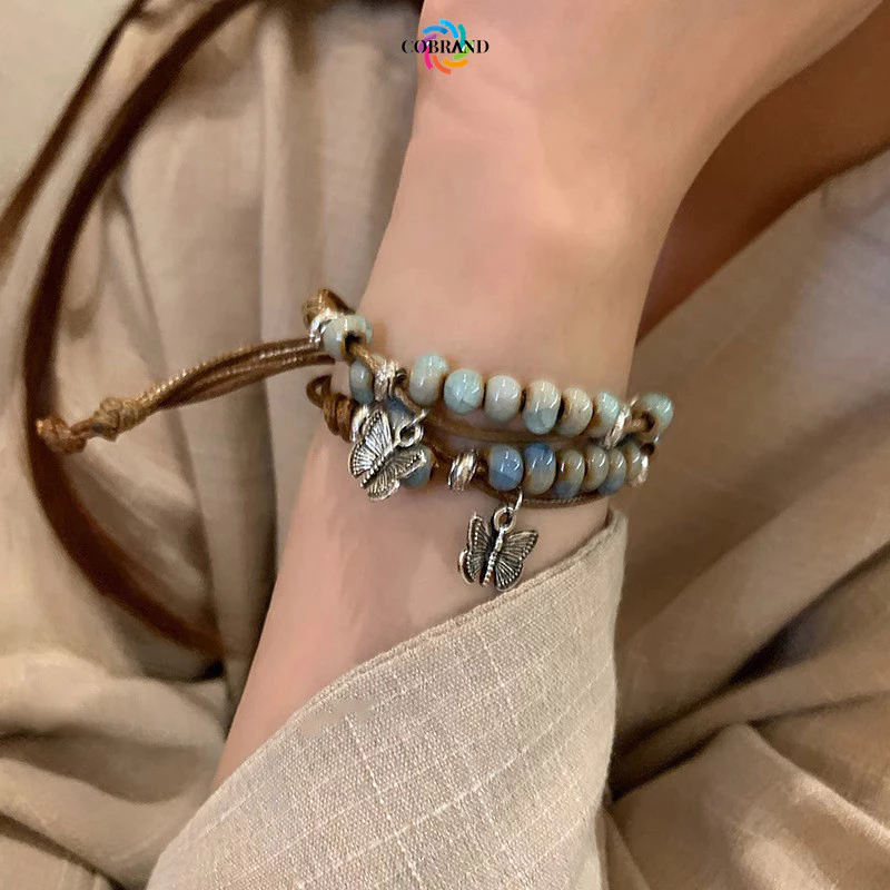 ส่งจากไทย⚡สร้อยข้อมือผีเสื้อถักลูกปัดเซรามิกสไตล์จีนย้อนยุคแฟชั่นเครื่องประดับปรับขนาดสําหรับผู้ชายและผู้หญิง.COD